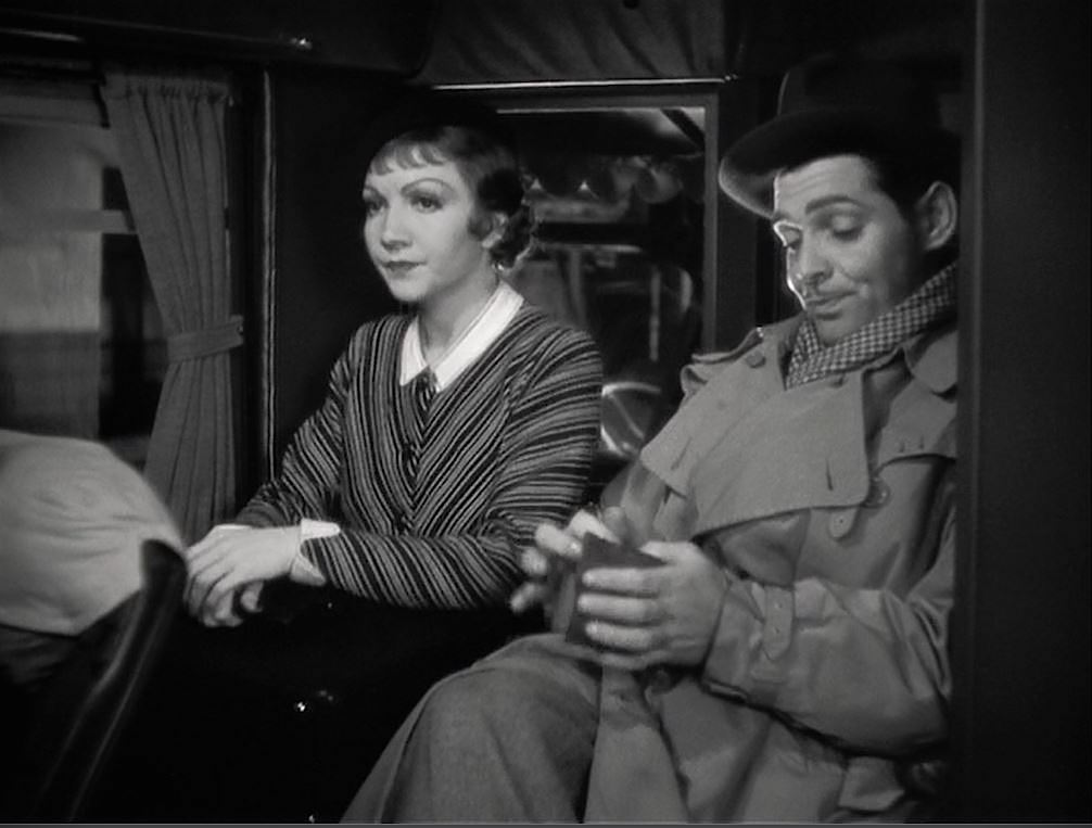 Claudette Colbert as Ellie Andrews and Clark Gable as Peter Warne travel on the night bus to New York.