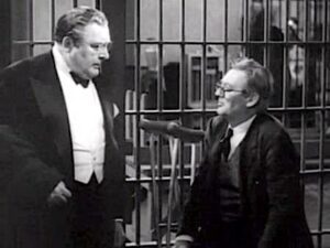 Photo of Kirby (Edward Arnold) and Grandpa (Lionel Barrymore) in the county jail.