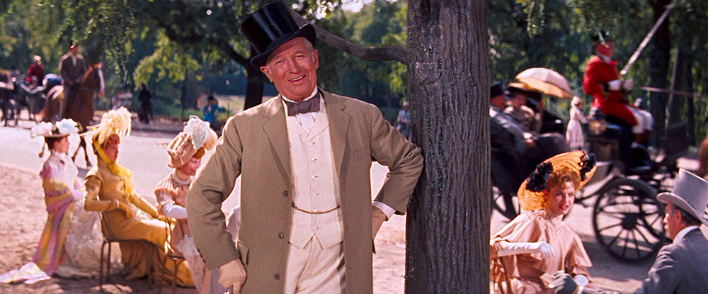 Photo of Maurice Chevalier as Honoré, singing "Thank Heaven for Little Girls."