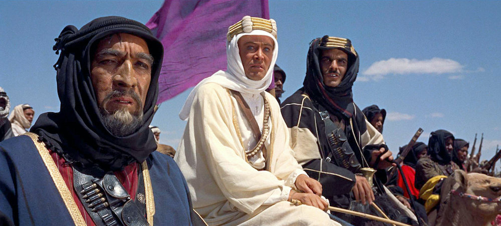 Photo of Anthony Quinn, Peter O'Toole, and Omar Sharif.