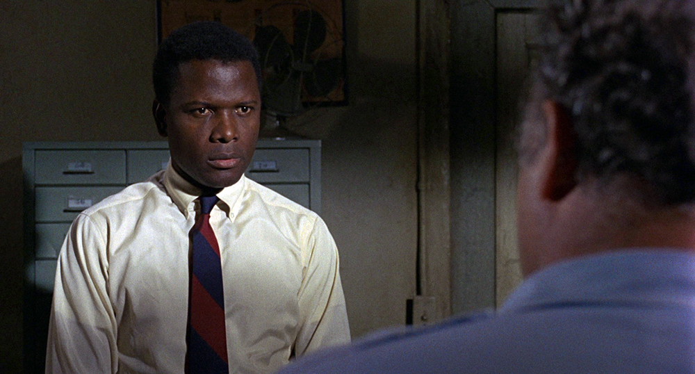 Photo of Sidney Poitier and Rod Steiger.