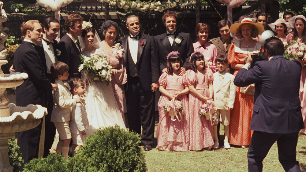 Photo of Robert Duvall, John Cazale, Gianni Russo, Talia Shire, Morgana King, Marlon Brando, James Caan, Julie Gregg, Al Pacino, and Diane Keaton.