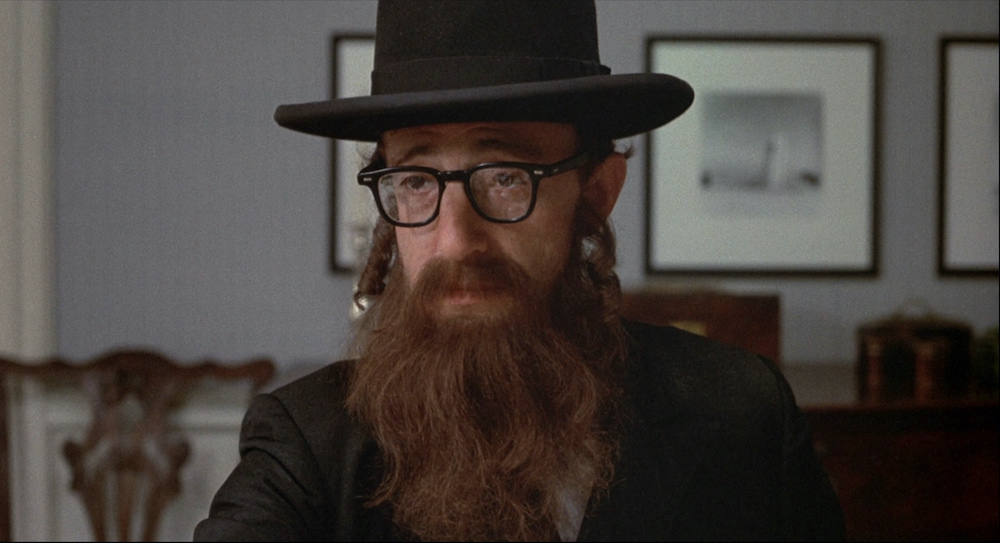 Photo of Alvy Singer (Woody Allen), as he perceives himself through the eyes of Annie's relatives.