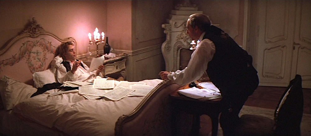 Tom Hulce as Mozart dictates the Requiem to F. Murray Abraham as Salieri.