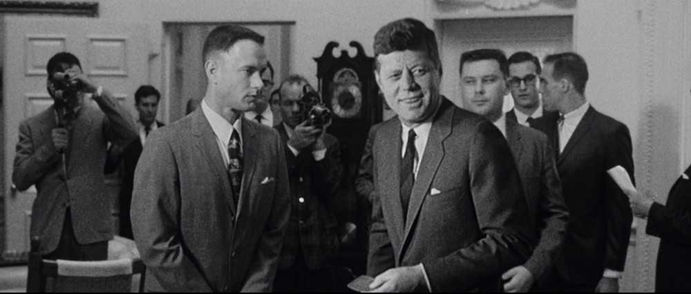 Photo of Tom Hanks and John F. Kennedy.