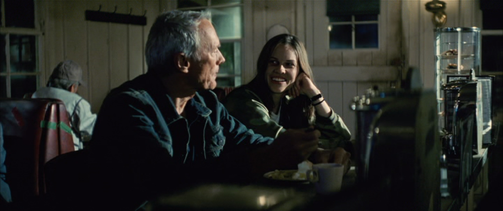Photo of Clint Eastwood as Frankie and Hillary Swank as Maggie.