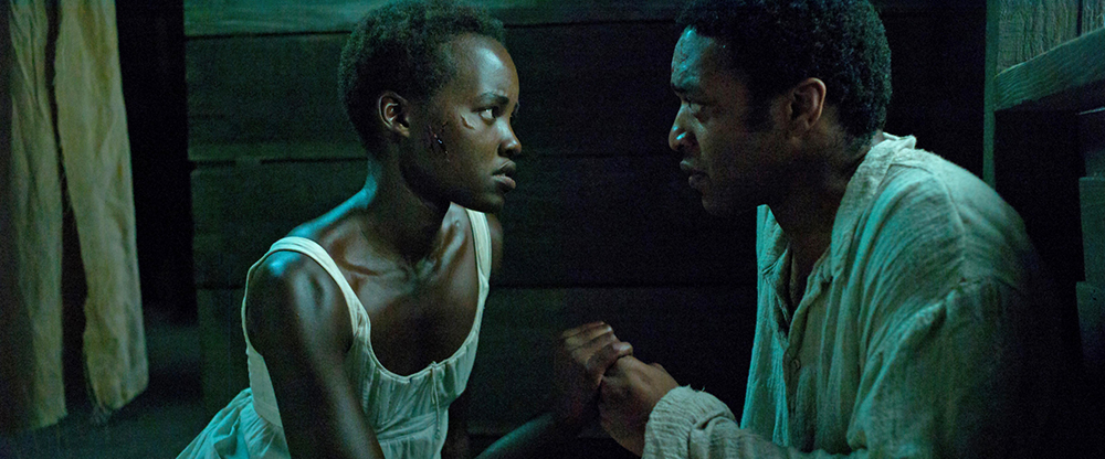 Photo of Lupita Nyong'o as Patsey and Chiwetel Ejiofor as Solomon Northup.