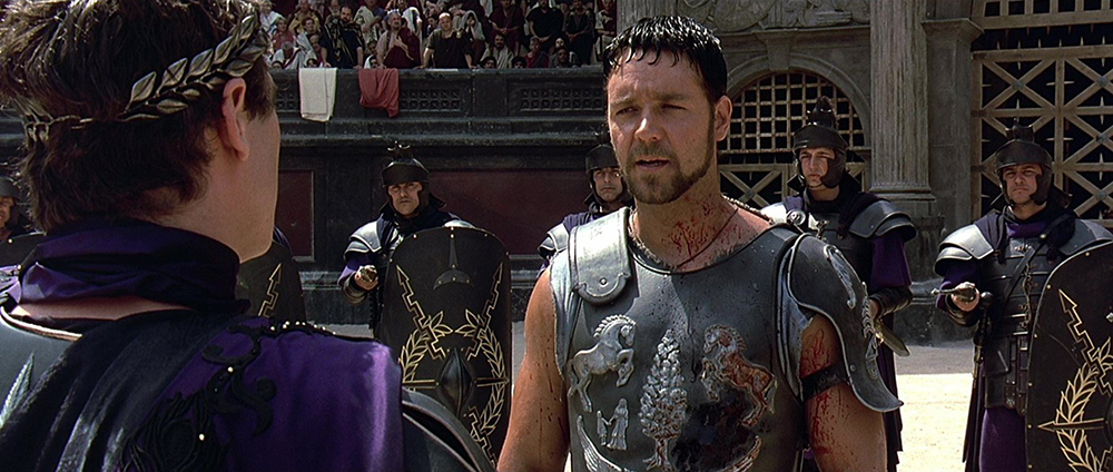 Photo of Joaquin Phoenix as Commodus and Russell Crowe as Maximus.