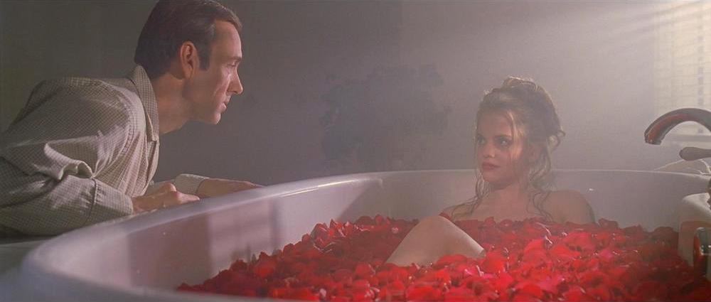 Photo of Kevin Spacey as Lester and Mena Suvari as Angela in a fantasy sequence.