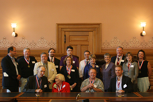 The celebrated authors of the 2010 Kansas Notable Books, along with Roy Bird (Director of the Kansas Center for the Book) and Jo Budler (State Librarian of Kansas). They're the two without the medals hanging around their necks.