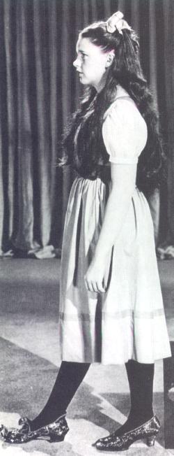 Judy Garland testing the Arabian Shoes on her front foot for "The Wizard of Oz."