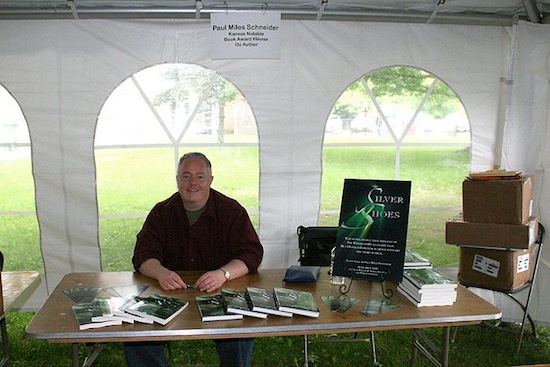 Paul's perch! A table for "Silver Shoes" in Authors Alley, located inside Glinda's Royal Tent---the enormous tarp-covered pavilion that housed fellow authors, illustrators, MGM Munchkins, Baum relatives, and other assorted Oz luminaries, plus a silent auction! All of us together under one roof for a weekend of signings and greetings.