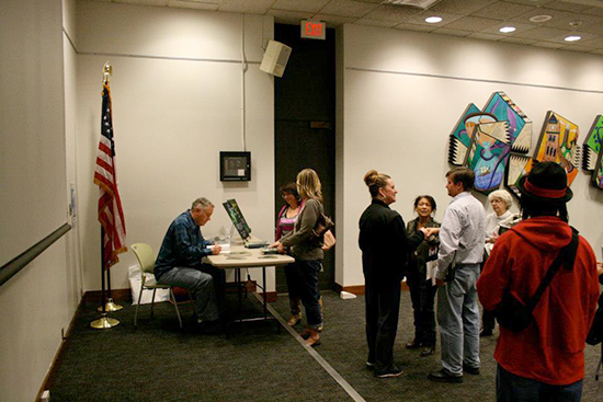 Signing copies of "The Powder of Life" and "Silver Shoes" at the Lawrence Public Library in Lawrence, Kansas, on October 18, 2012.