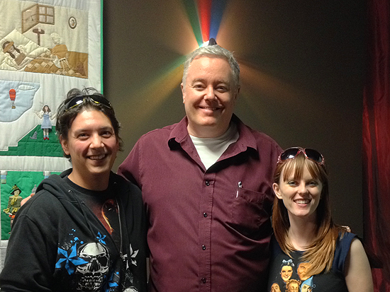 Paul Miles Schneider (center) poses with two delightful Oz fans, Chris and Katlyn, who came all the way from Des Moines, Iowa, for the festival. And yes, that's a rainbow bursting out of Paul's head! This was taken following one of his presentations at this year's OZtoberfest! Wamego, Kansas. 2013.