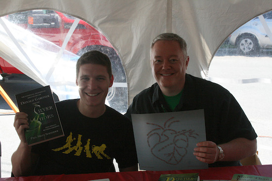 Aaron Harburg and Paul Miles Schneider were signing buddies in the special-guest tent for Oz-Stravaganza! 2014. Aaron holds a copy of Paul's "Silver Shoes" book while Paul holds up one of Aaron's four artwork pieces inspired by his great-grandfather Yip's lyrics to "The Wizard of Oz." The words form visual impressions that represent the songs. Can you guess what this one is?
