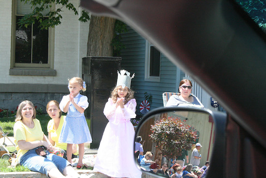 A photo taken from the black Thunderbird convertible by Paul Miles Schneider as he was driven down the parade route during Oz-Stravaganza! How could he resist such a lovely Dorothy and Glinda?