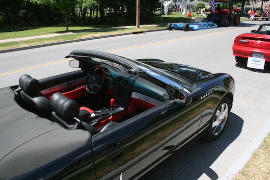 Navigating the parade route in style! This was the black Thunderbird convertible carrying Paul Miles Schneider for the 2014 Oz-Stravaganza! parade.
