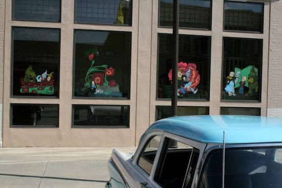 Wonderful window art based on the original W.W. Denslow Oz illustrations! The windows of all the storefronts were painted on both sides of the street. OZtobeFest 2014, Wamego, Kansas.