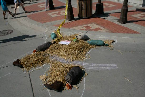 Poor Scarecrow. This "display" was featured just off the curb with a sign warning people against the perils of texting while driving. True enough. OZtoberFest 2014, Wamego, Kansas.