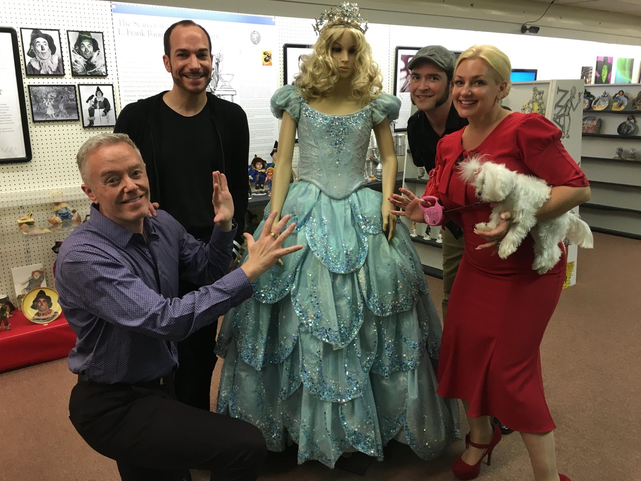 Fun with good friends and new friends as we oogle Glinda's dress from the Broadway production of "Wicked," on loan to the All Things Oz Museum for the next two months! (Left to right:) Paul Miles Schneider, Ryan Jay, Vincent Myrand, and Emma Ridley.