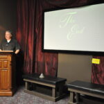 Photo of Paul Miles Schneider finishes up a presentation inside the Oz Museum - Wamego, Kansas.